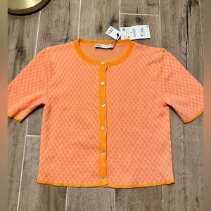 orange and pink button up top